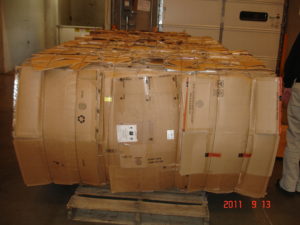 bales of cardboard to recycle in vertical baler