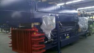 car factory reduces waste with baler