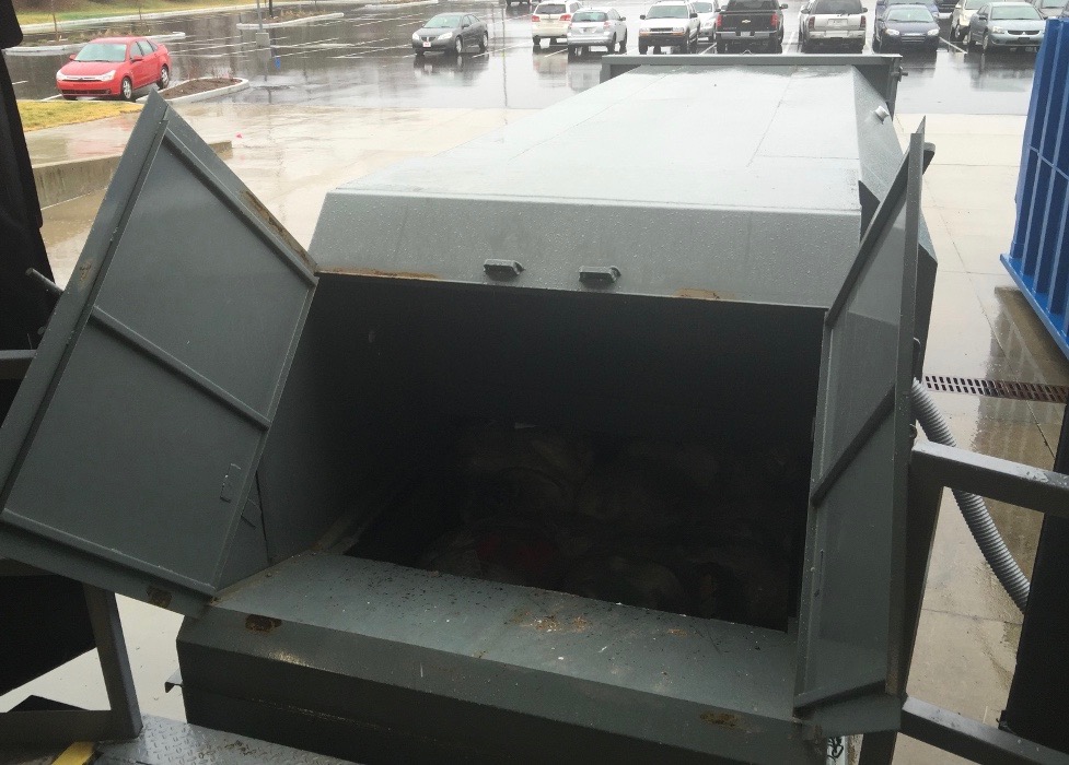 Dock-Friendly Self-Contained Compactor with Doghouse