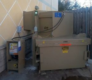 vertical waste compactor