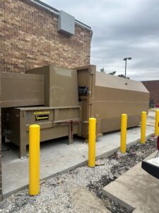 2 yard short back stationary compactor