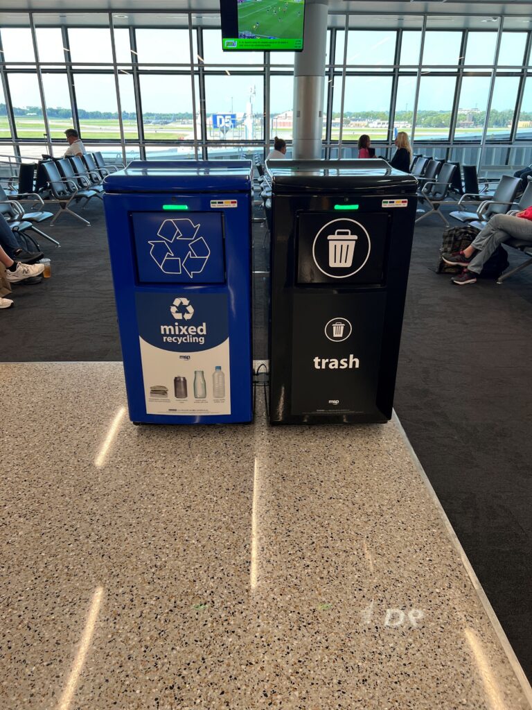 Custom-wrapped Harmony SmartPack Automatic Trash Compactors installed at MSP Airport