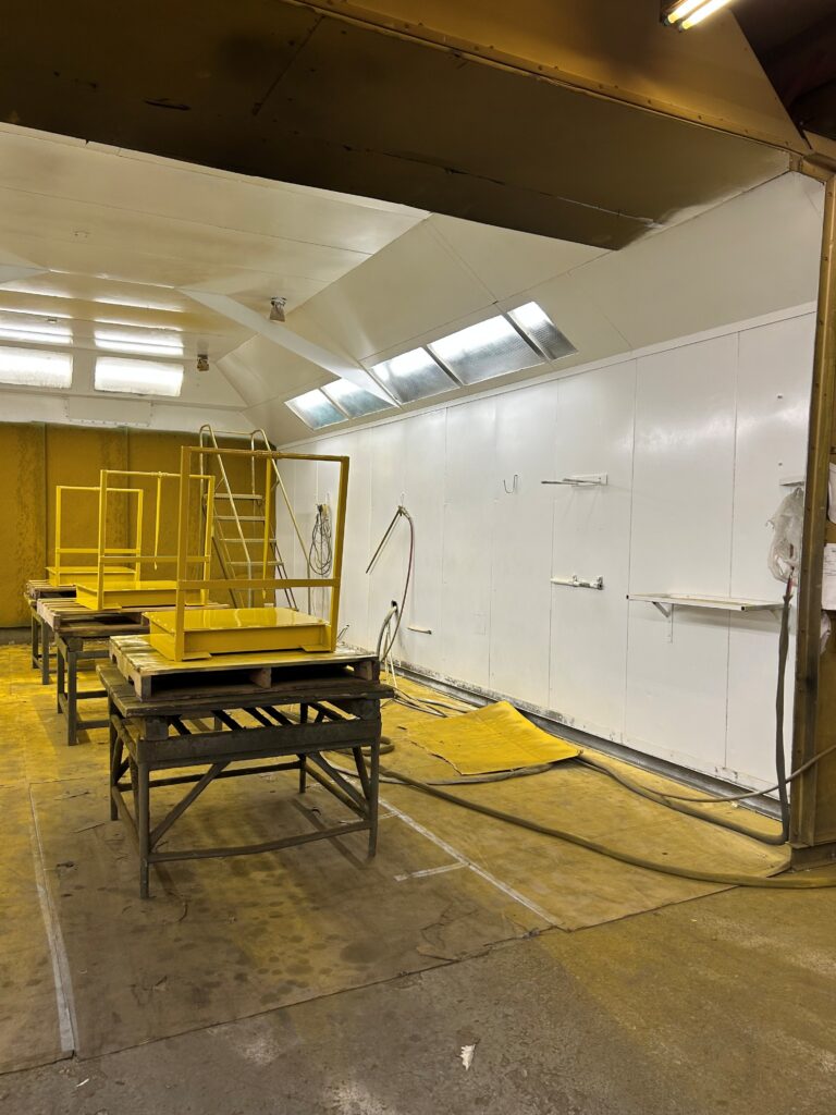 harmony just painted their paint booth for higher visibility