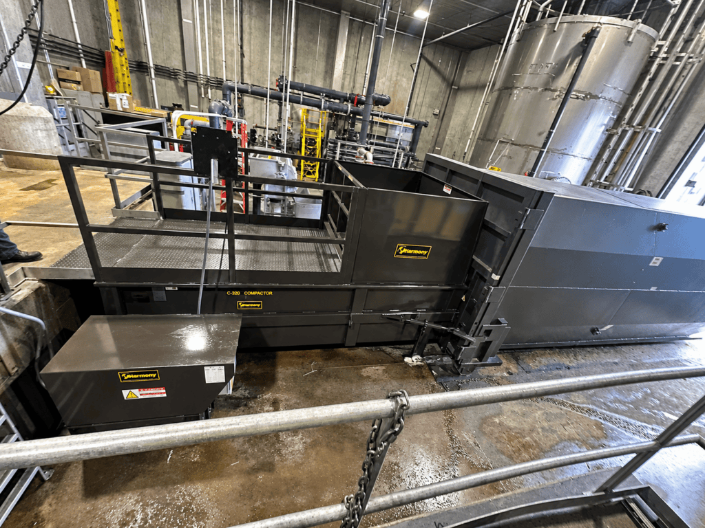 harmony's c300 walk on deck compactor and container